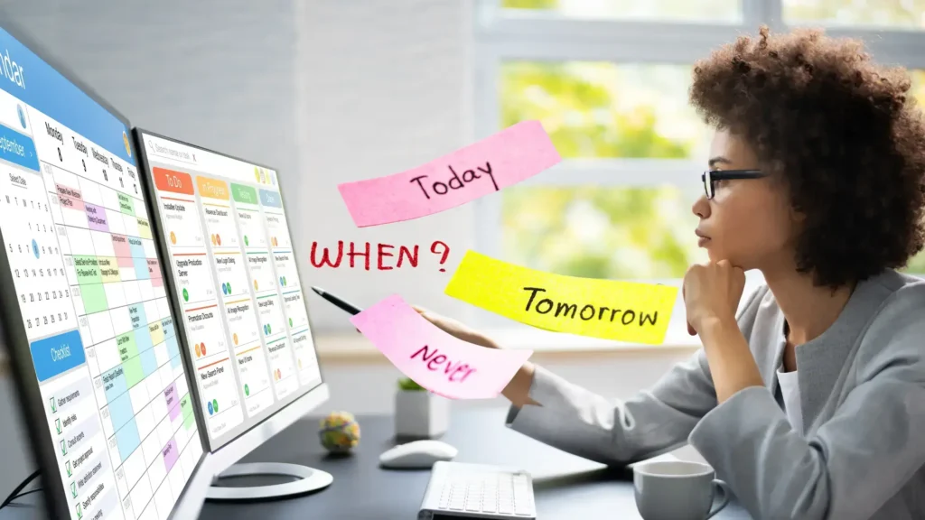 How to Manage Time as a Freelance Writer. A Freelance writer on her work table looking at a digital calendar and pointing with a pen.