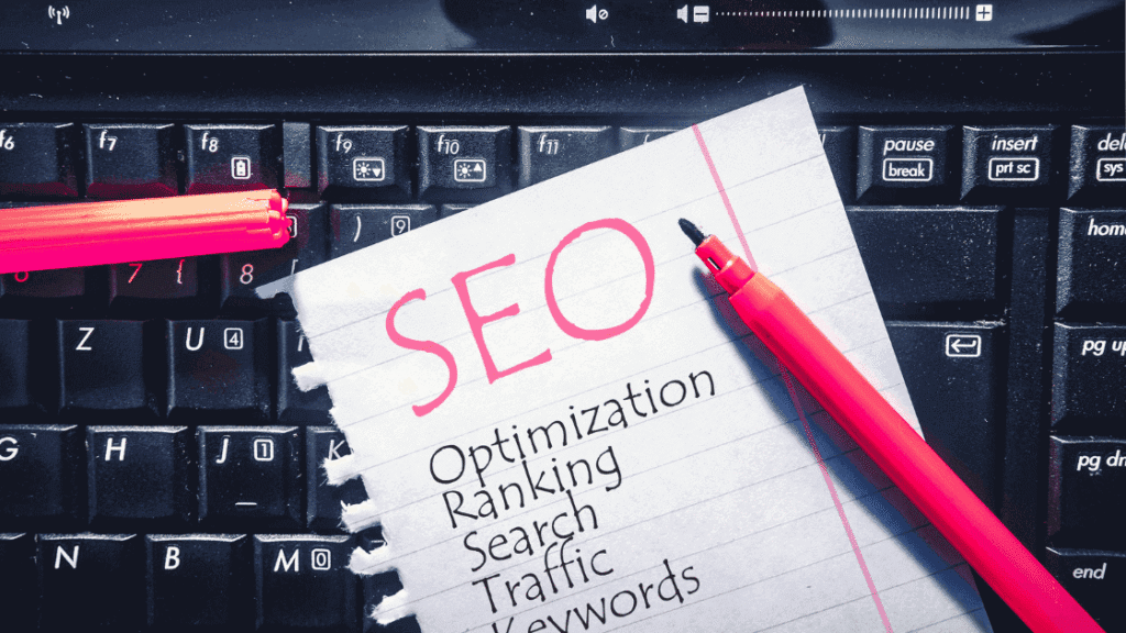 A checklist on a keyboard showing on-page optimization strategies Nigerian writers need